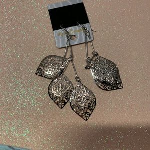 Dangling silver tone leafs